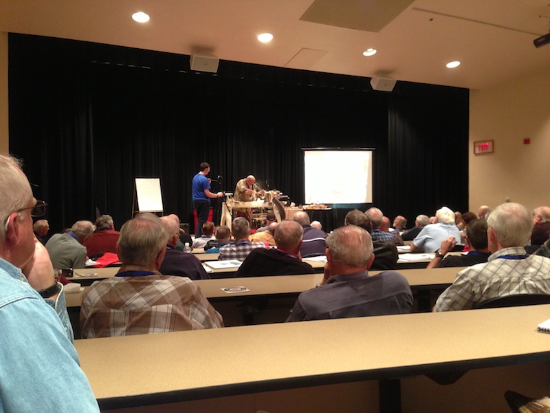 Richard Raffan on stage turning a bowl for the Desert Woodturning Roundup