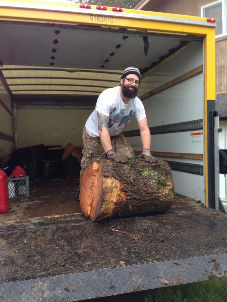 JOSH UNLOADING WOOD FROM TRUCK